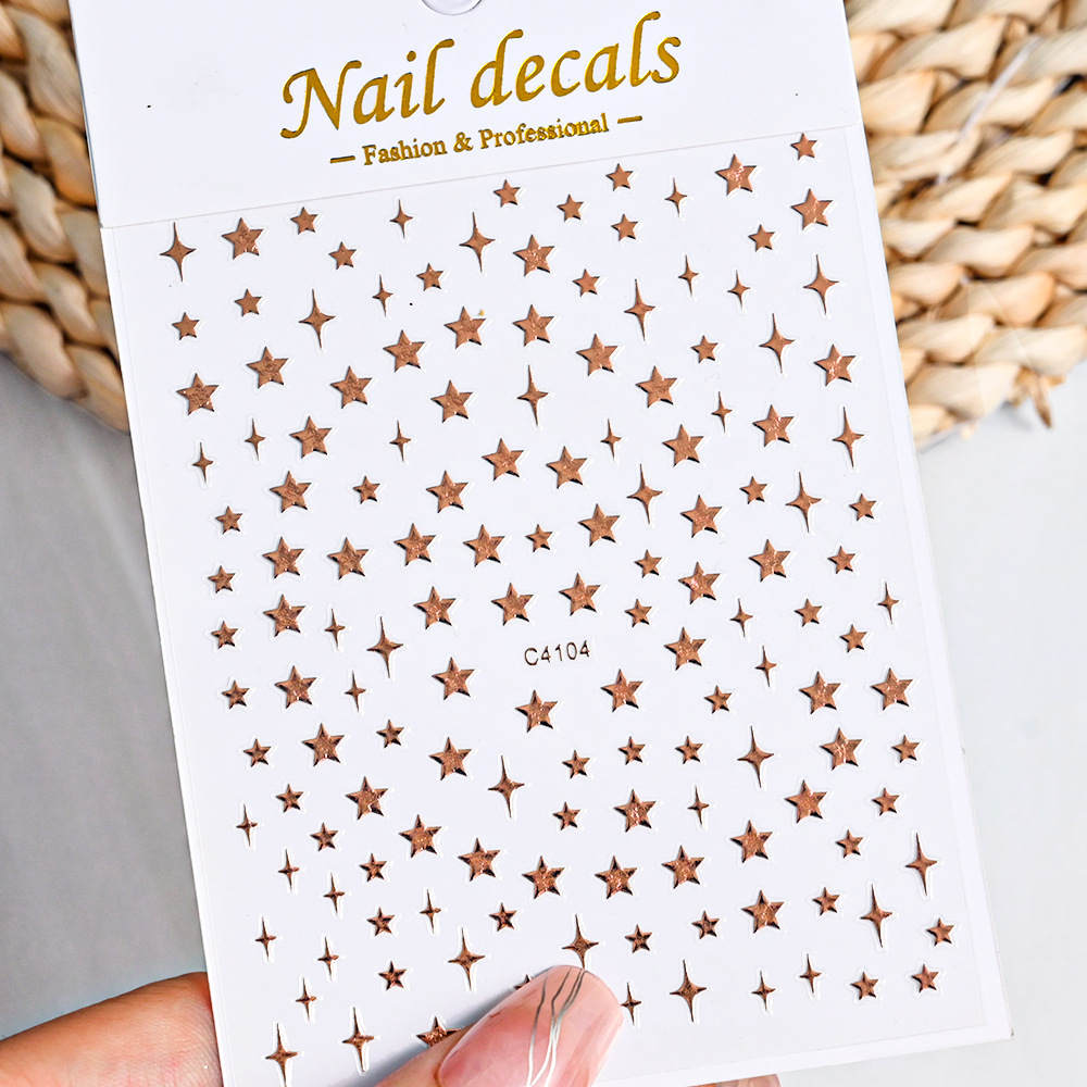 Cross-border hot sale laser Starry Sky nail stickers 3D adhesive moon four Awn star mix and match hot girl nail decorative stickers