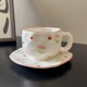 Pink flower cup and saucer