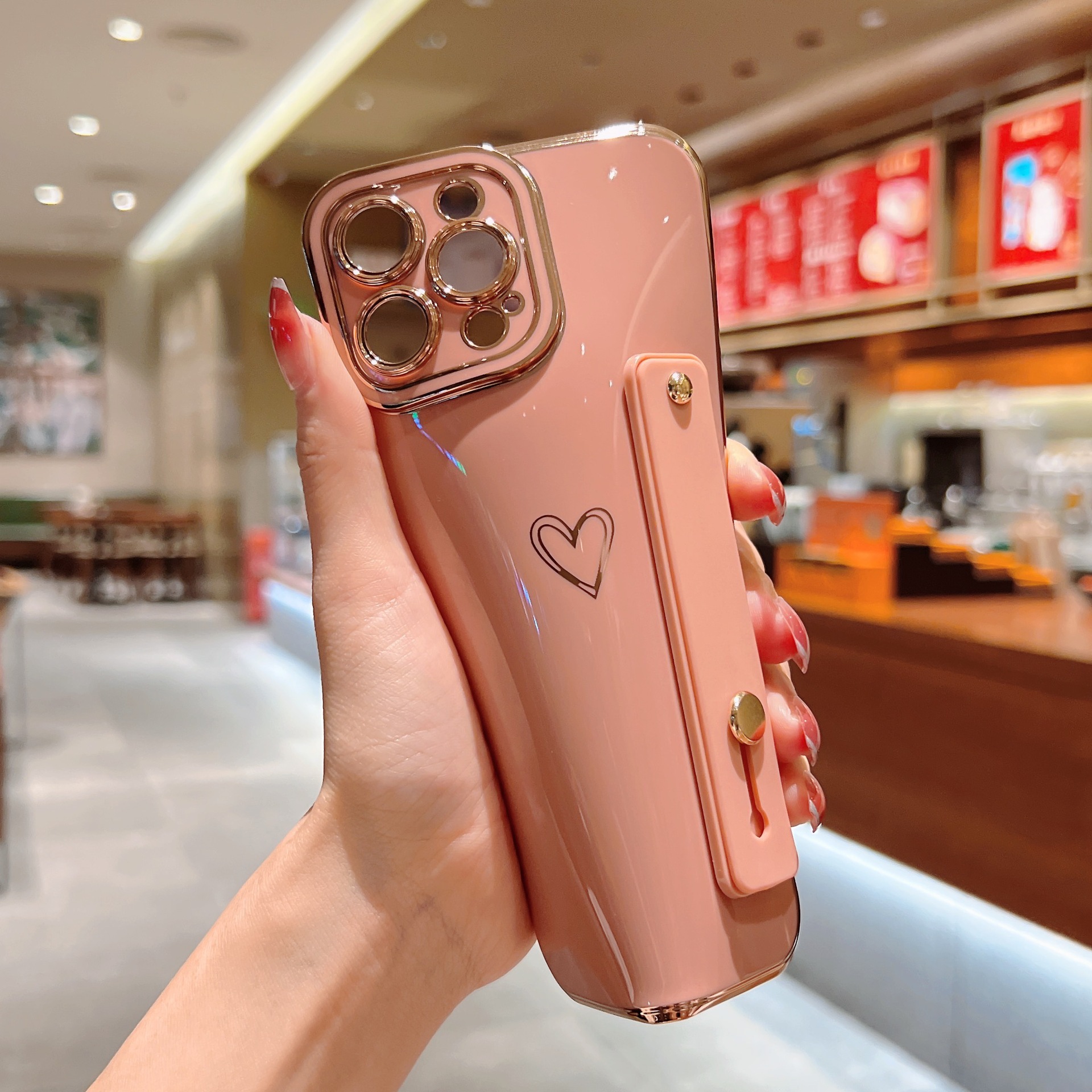 適用於iPhone13PROMAX魅眼側邊腕帶愛心X/12手機殼蘋果14支架瞳眼
