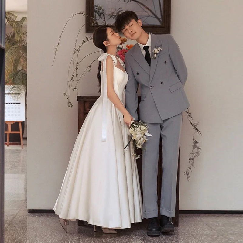 French-style light wedding dress sling niche high-grade bow outdoor travel photography engagement license small dress pettiskirt autumn