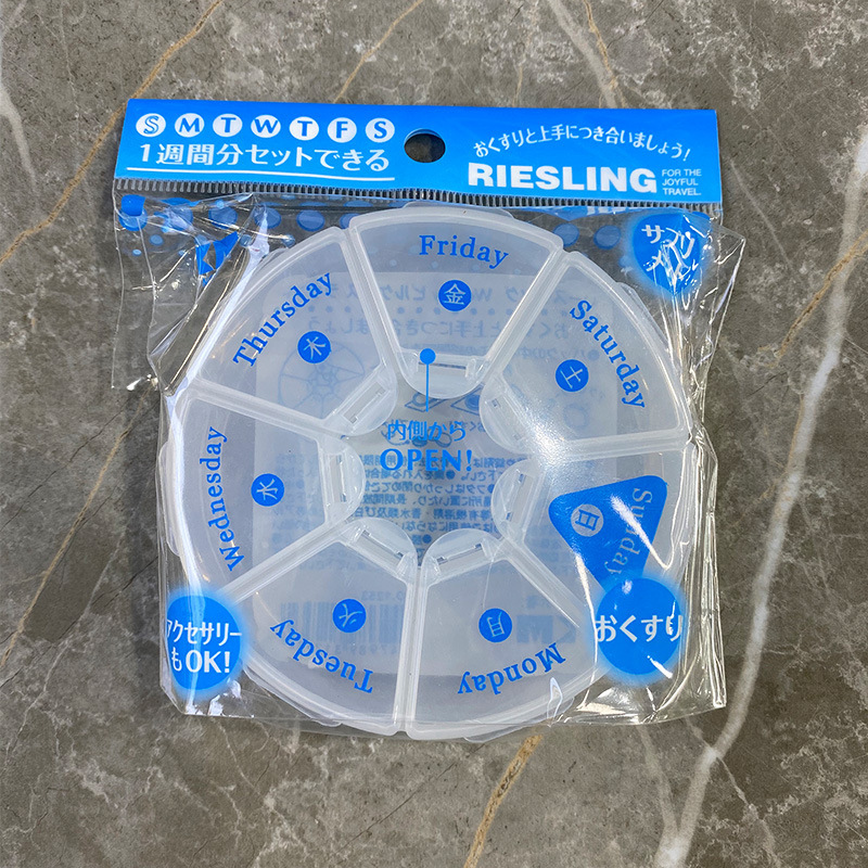 Japan km.1253.Seven-grid Week Pills Box Round Tablet Storage Box Travel Pills Box