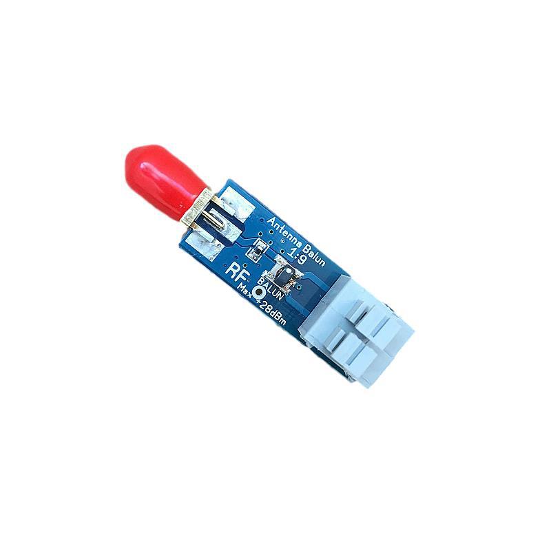 Miniature 1:9 HF antenna balun