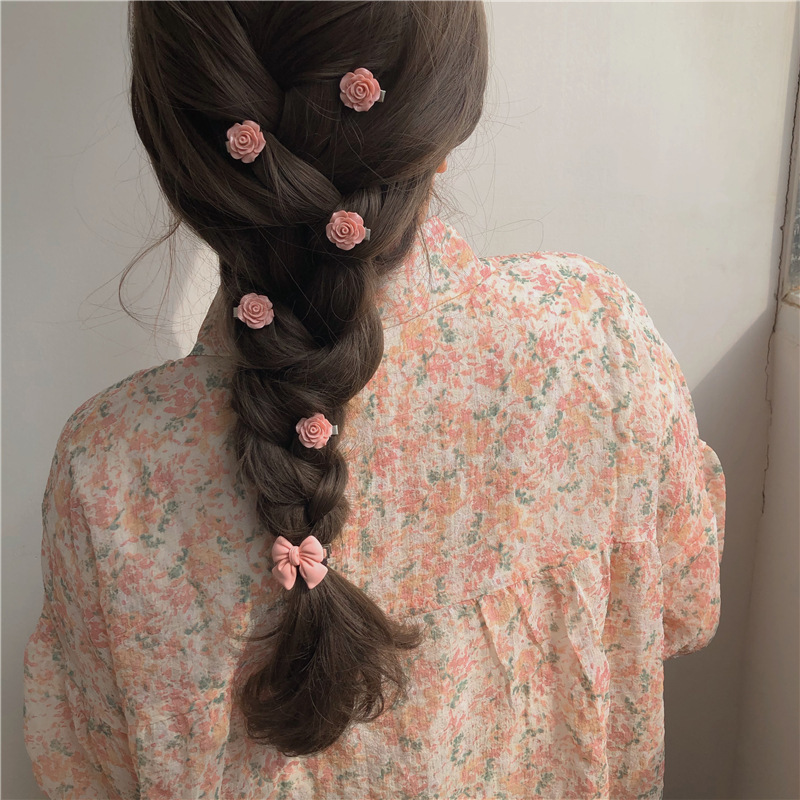 ピンクの柔らかい妹のかわいいシリーズの水蜜桃のヘアピンのヘアピンの甘い美しい風のツバキの花の縁は蝶結びの髪飾りを挟みます。|undefined