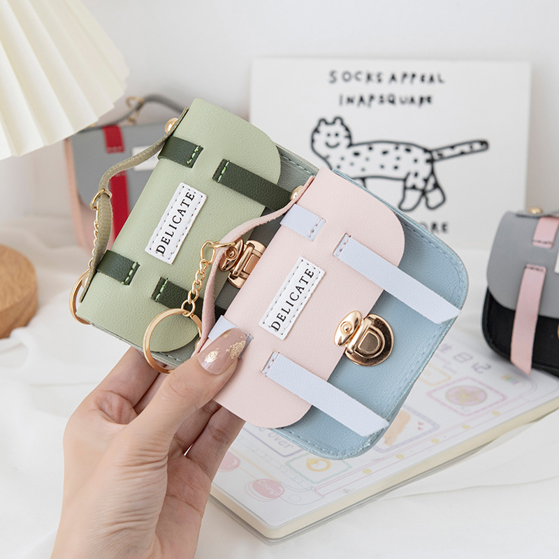 Coin purse wholesale cute female creative mini bag cover lock coin bag keychain pendant small wallet