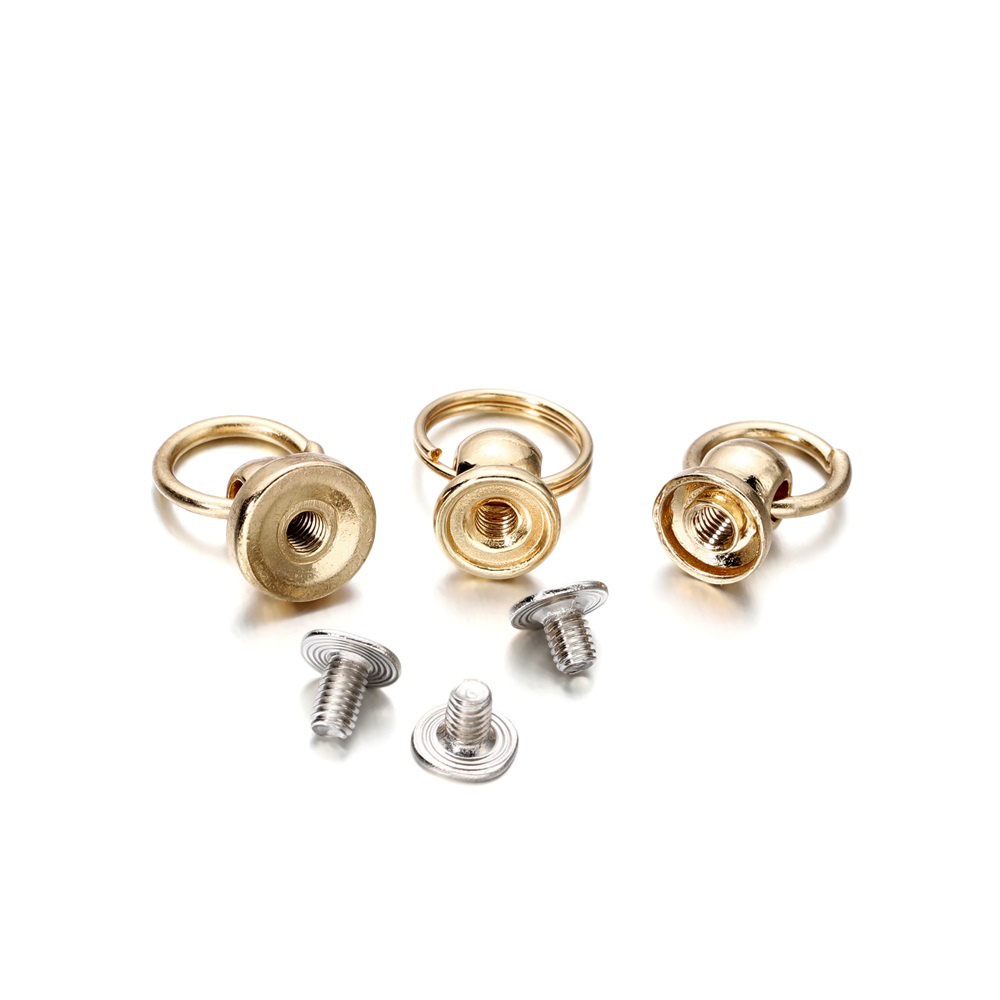 In stock zinc alloy with ring Heshang head nipple nail mobile phone shell accessories decorative nail doll hanging ring rotating Heshang head