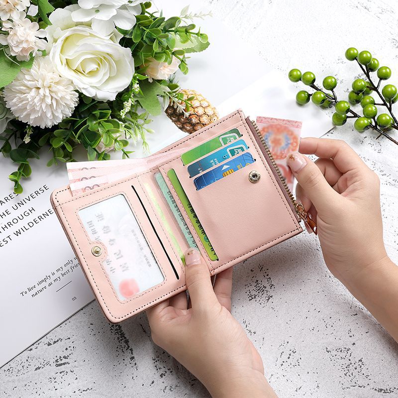 New retro small wallet ~ ins wallet female short student European and American Fresh folding simple artistic buckle