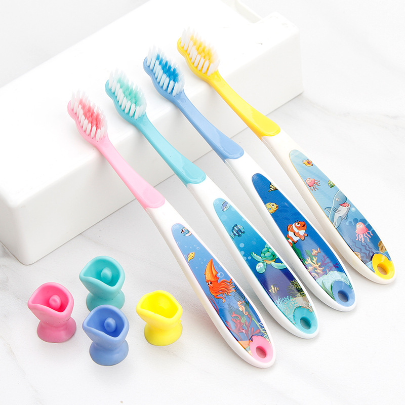 Stall supply 3-12 years old children's toothbrush soft hair cartoon handle foreign trade Macaron baby toothbrush manufacturers wholesale