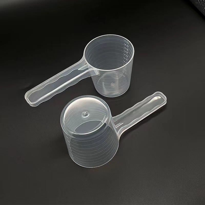 Plastic measuring spoon 100ml graduated pet feed spoon 50g powder liquid particles baking measuring spoon wholesale