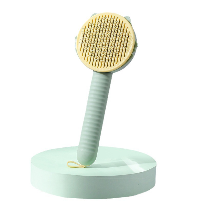 Cross-border new pet comb cleaning beauty cat hair removal needle comb dog one-click hair removal brush supplies wholesale