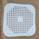Old square floor drain white without five-pointed star in the middle