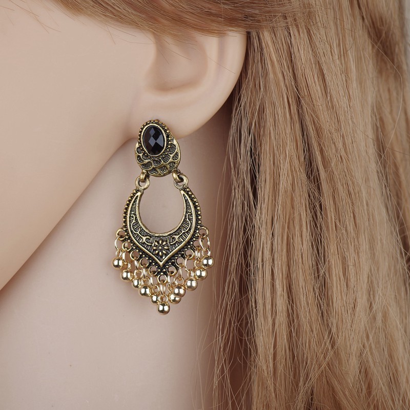 European and American cross-border jewelry fashion vintage earrings ethnic style carved beads black gem tassel earrings