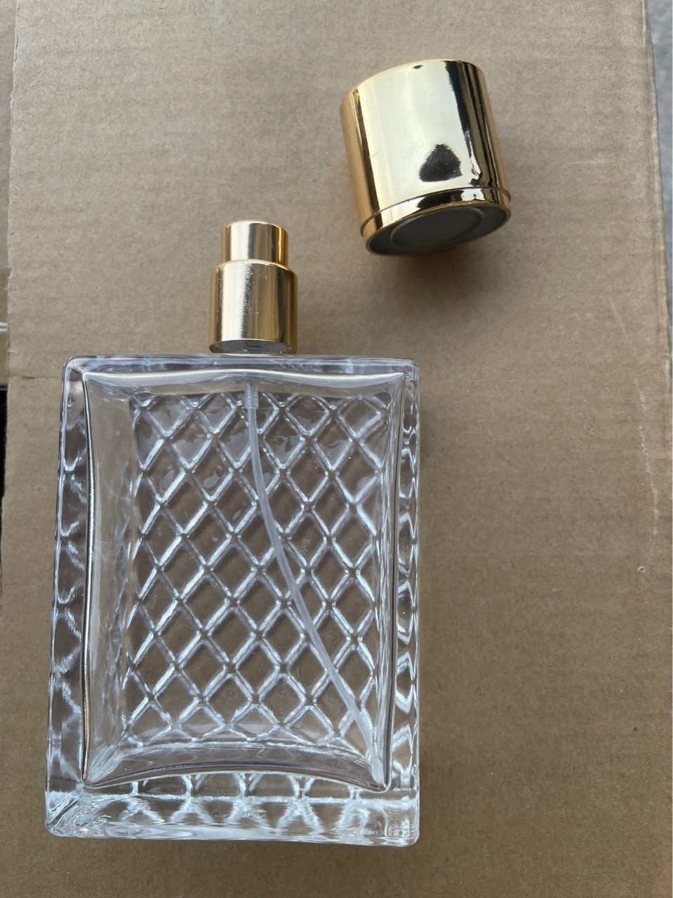 Spot 100ml grid thick glass spray bottle prismatic perfume bottle square makeup empty bottle