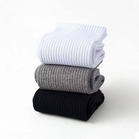 Summer solid color Joker black and white men's and women's sports high stockings simple cotton soft men's socks Zhuji socks wholesale