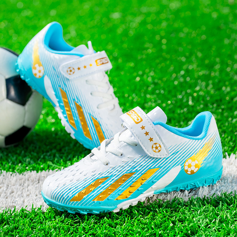 Cross-border children's football shoes boys and girls low-top leather surface broken nail sneakers artificial grass competition training sneaker