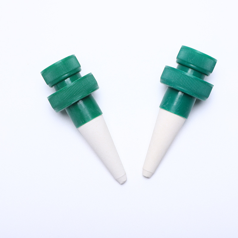 コーラの瓶の無線の怠け者の花をやる器の陶磁器のしみ込み器の水をやる水は自動的に水を垂らして灌漑します。|undefined