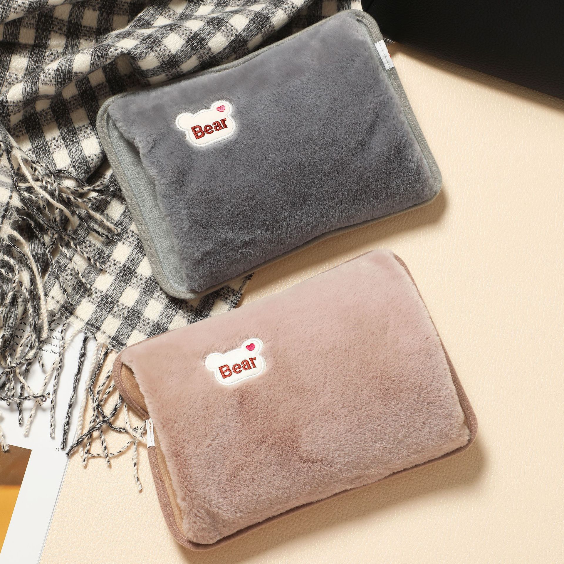 In stock safety explosion-proof charging hot water bag bear head embroidery hand pillow electric heating bag removable and washable hand warmer foreign trade