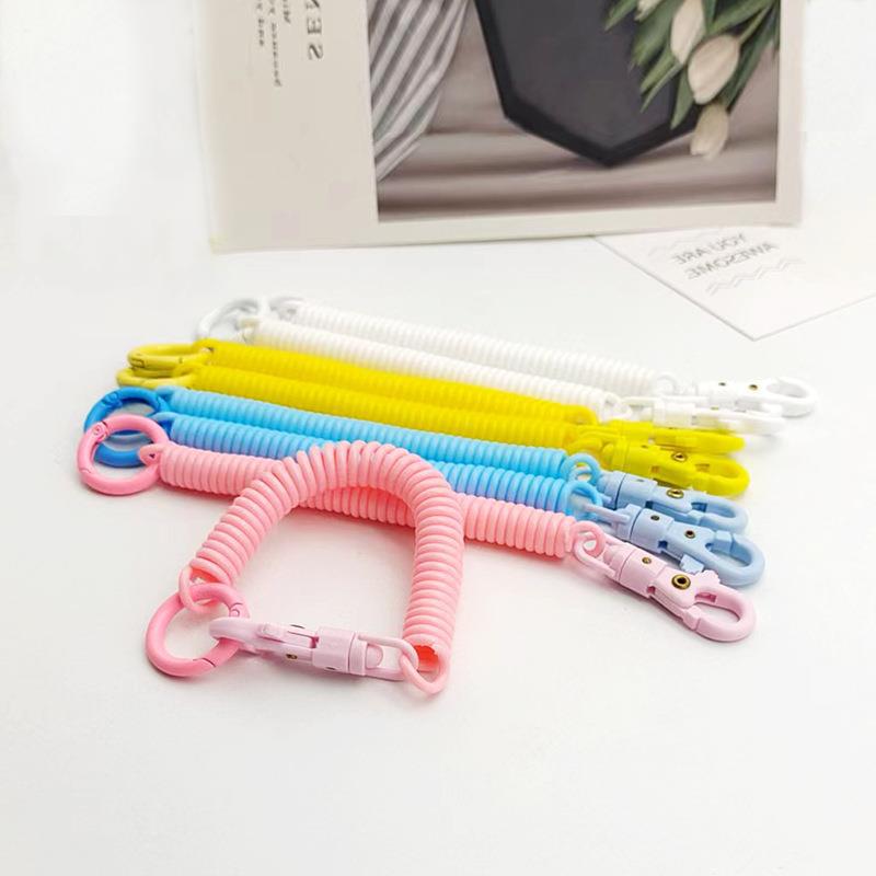 Factory wholesale plastic spring rope jelly color key chain bag card set lanyard key chain elastic anti-loss rope