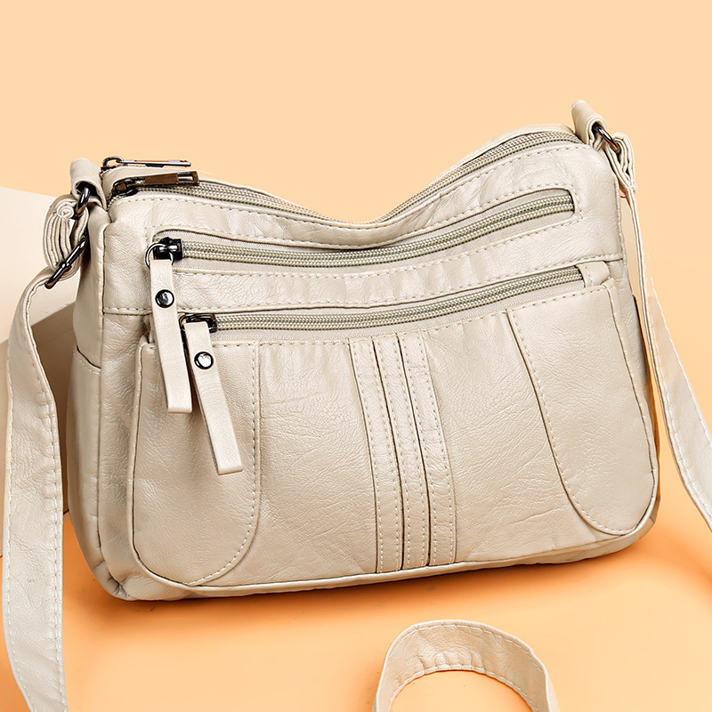 Women's bag 2023 new fashion simple shoulder bag soft leather multi-pocket messenger bag middle-aged women's mother bag