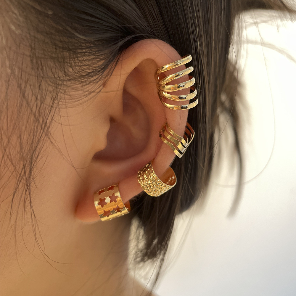 Conjunto criativo simples de quatro peças de clipe de orelha dourado, conjunto de clipe de orelha tipo C com estrela personalizada de metal_voghion.com