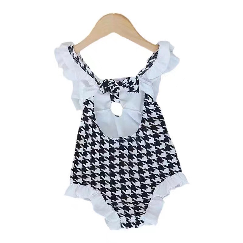 2023 New girls' swimsuit children's one-piece swimsuit triangle black and white flying bird bow fashion lace swimsuit