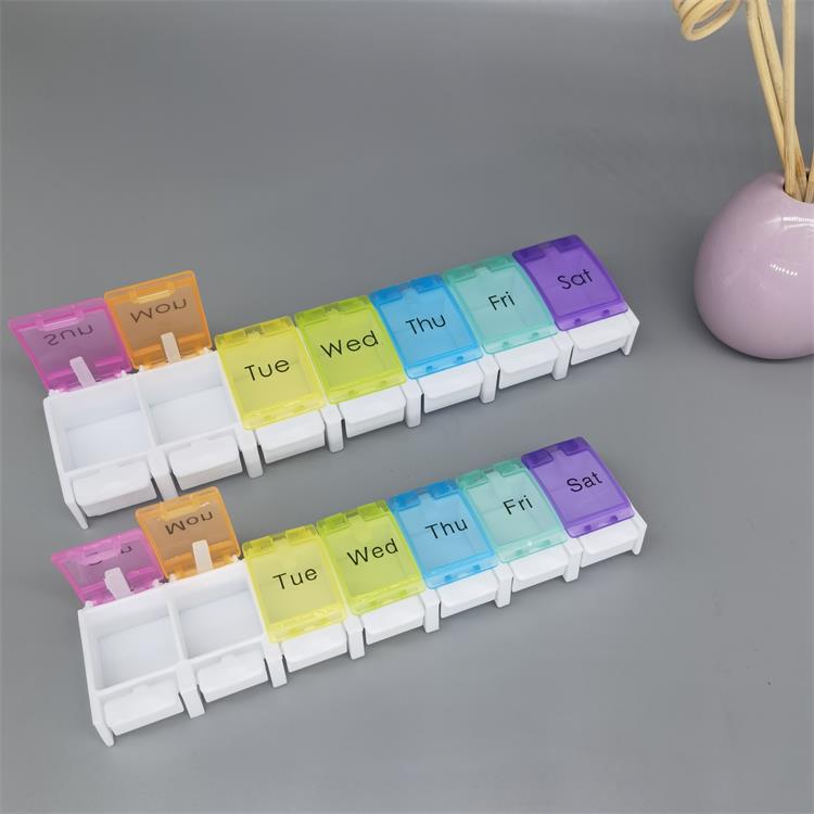 Double-row single-row one-week pill box with silicone press-type lid opening method 14-cell morning and evening week portable pill box
