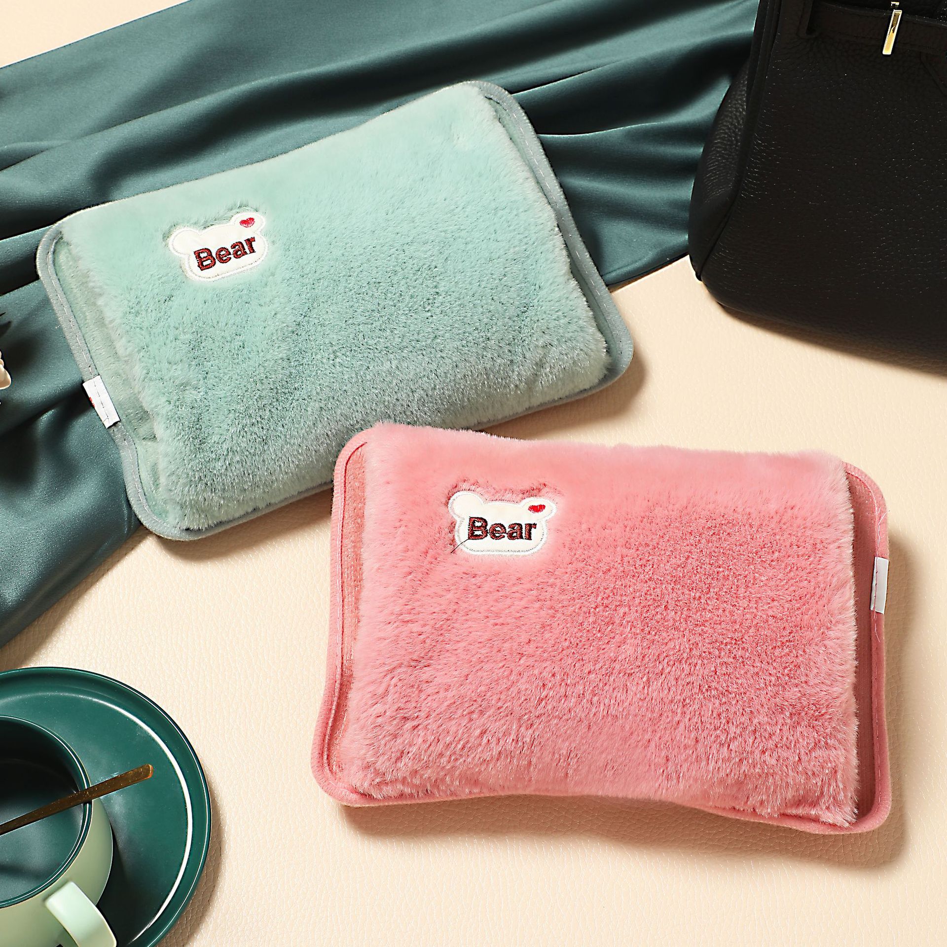 In stock safety explosion-proof charging hot water bag bear head embroidery hand pillow electric heating bag removable and washable hand warmer foreign trade