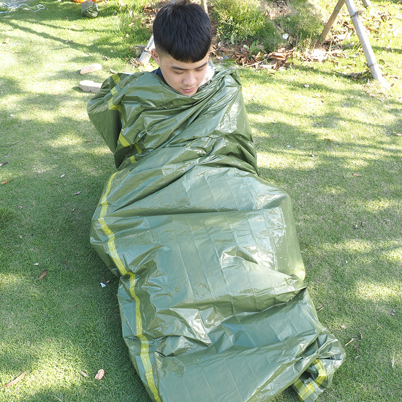 Outdoor emergency sleeping bag olive green envelope travel emergency sleeping bag pe tent disposable radiation blanket wholesale