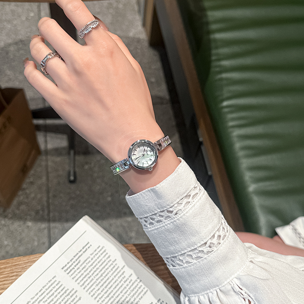 Time and Space Corridor New Entry Light Luxury Rhinestone Elegant Bracelet Watch Niche Simple Fashion Casual Women's Quartz Steel Band Watch