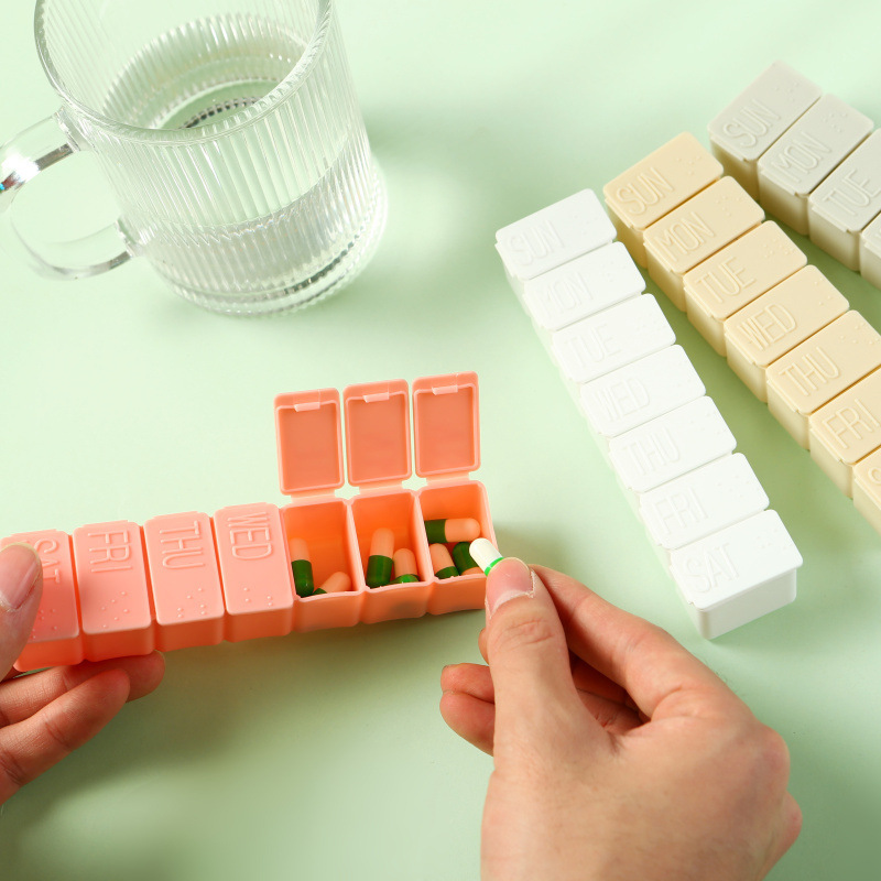 Wholesale weekly pill box strip-type 7-day pill box 7-grid sub-packing pill box convenient advertising storage box in stock
