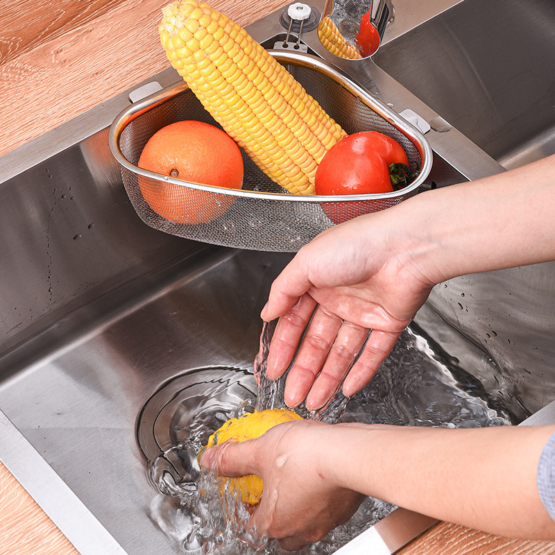 ステンレスの台所の水槽の濾過網の池の野菜を洗うたらいのふるいは残り物の残り物を漏らします。|undefined