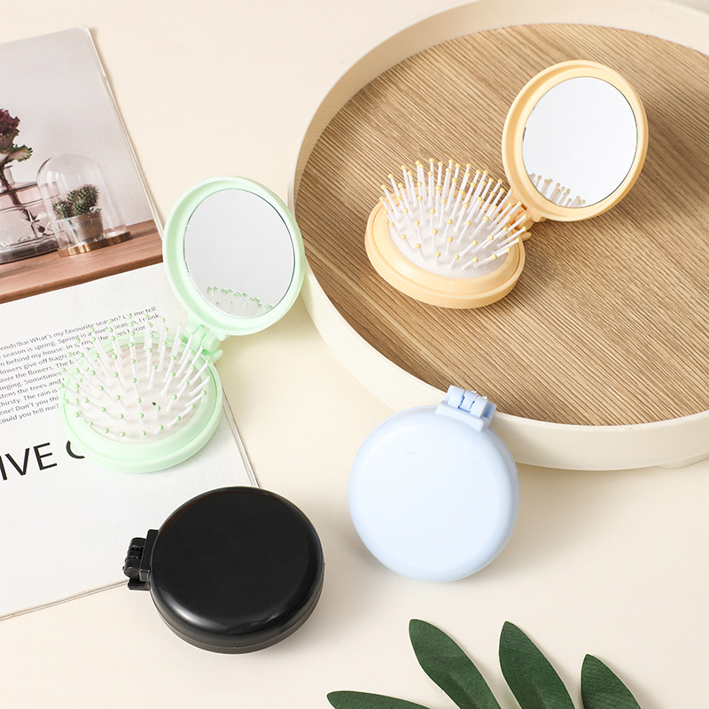 Folding cute mini portable round airbag mirror comb integrated comb with mirror flip ins style factory wholesale