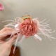Pink feather grip clip