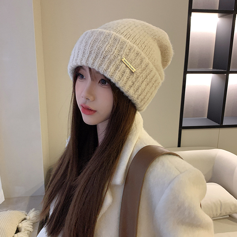 羊毛保暖堆堆帽女秋冬韓版潮金屬標針織帽男顯臉小寬鬆加厚毛線帽
