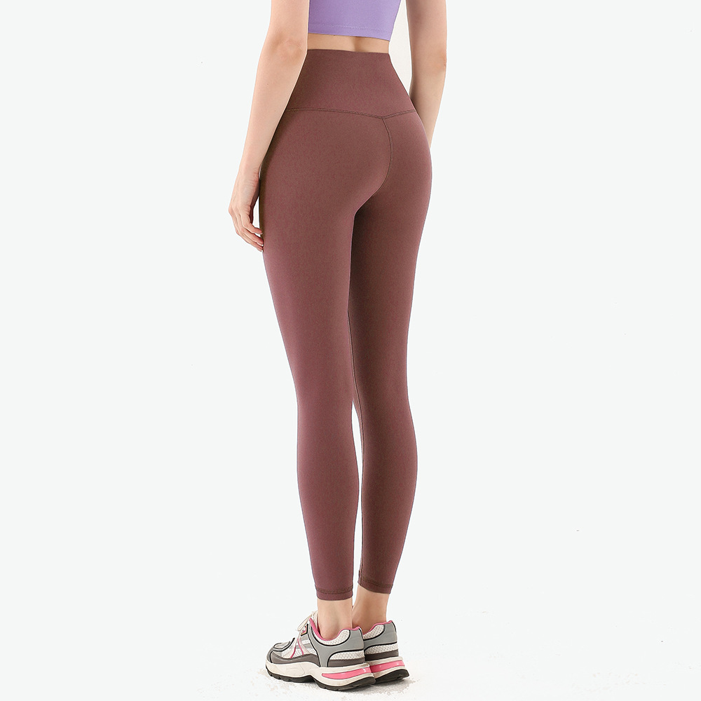 European and American Sports Sanding Naked Nine-point Fitness Pants Women's One-piece Quick-drying Tight High Waist Peach Hip Yoga Pants
