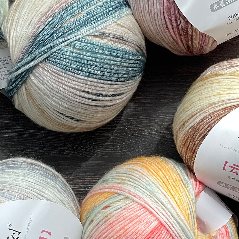 Ten engraved manufacturers wholesale cloud wool cotton spray wool series wool knitting hand gradient cake line soft