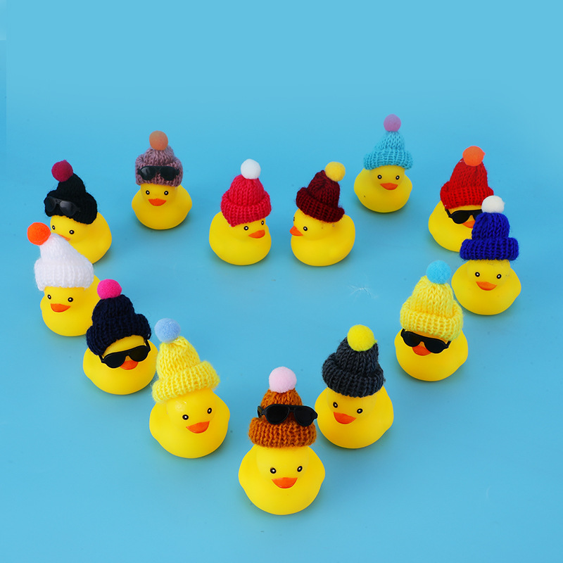 Little Yellow Duck playing water bath toy hat little duck hand playing lemon tea sunglasses vinyl doll duck