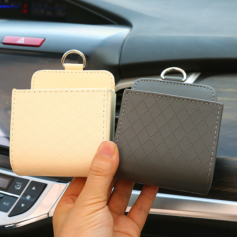 Car storage box car air outlet leather multifunctional mobile phone cigarette change card hanging pocket manufacturers