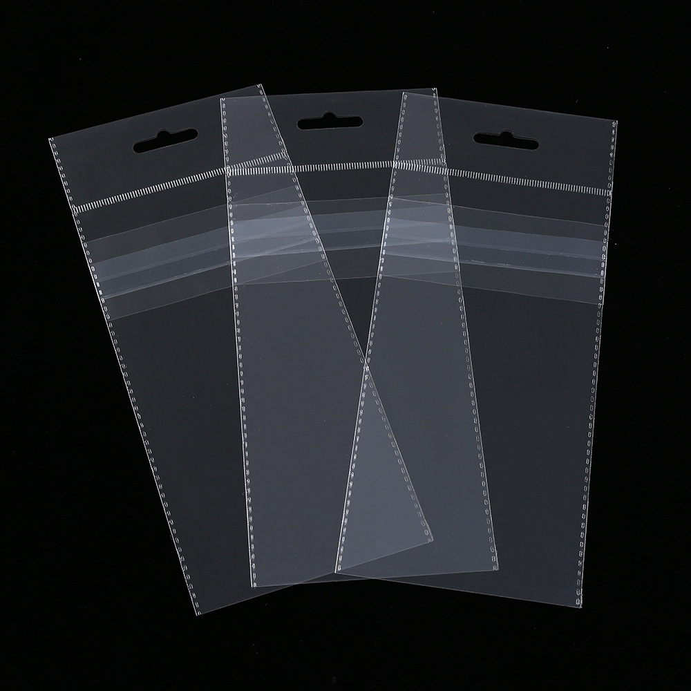 Spot OPP self-adhesive bag card head hanging hole transparent bag Pearl film card head bag aircraft hole transparent bag can be printed
