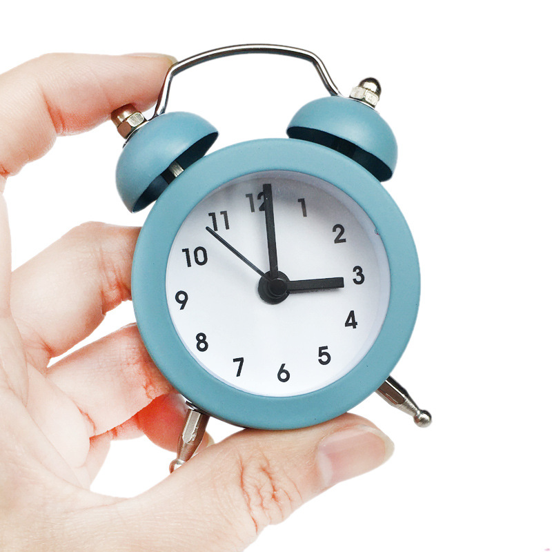 Factory direct supply creative cartoon mini metal alarm clock student children gift clock cross-border generation plus Logo