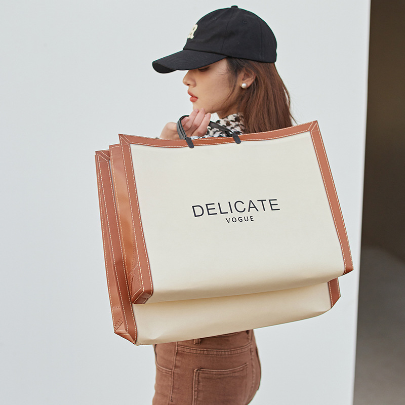 Spot coated non-woven bag portable clothing store bag shopping bag shopping bag fashion women's bag customization