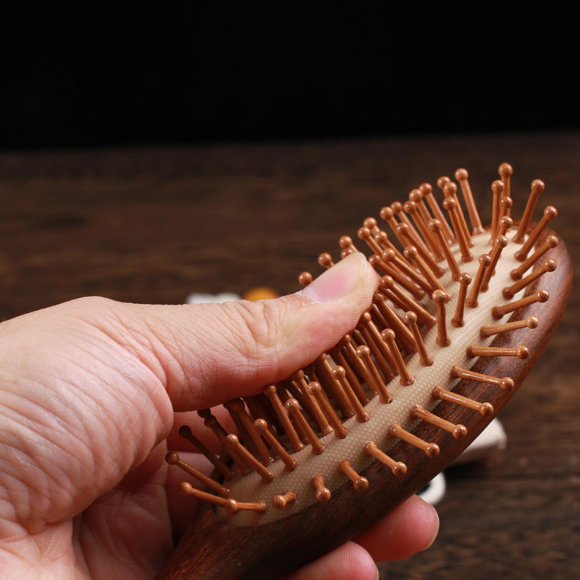 Factory gold sandalwood air cushion comb large thickened round handle scalp massage hair comb sandalwood airbag comb wholesale