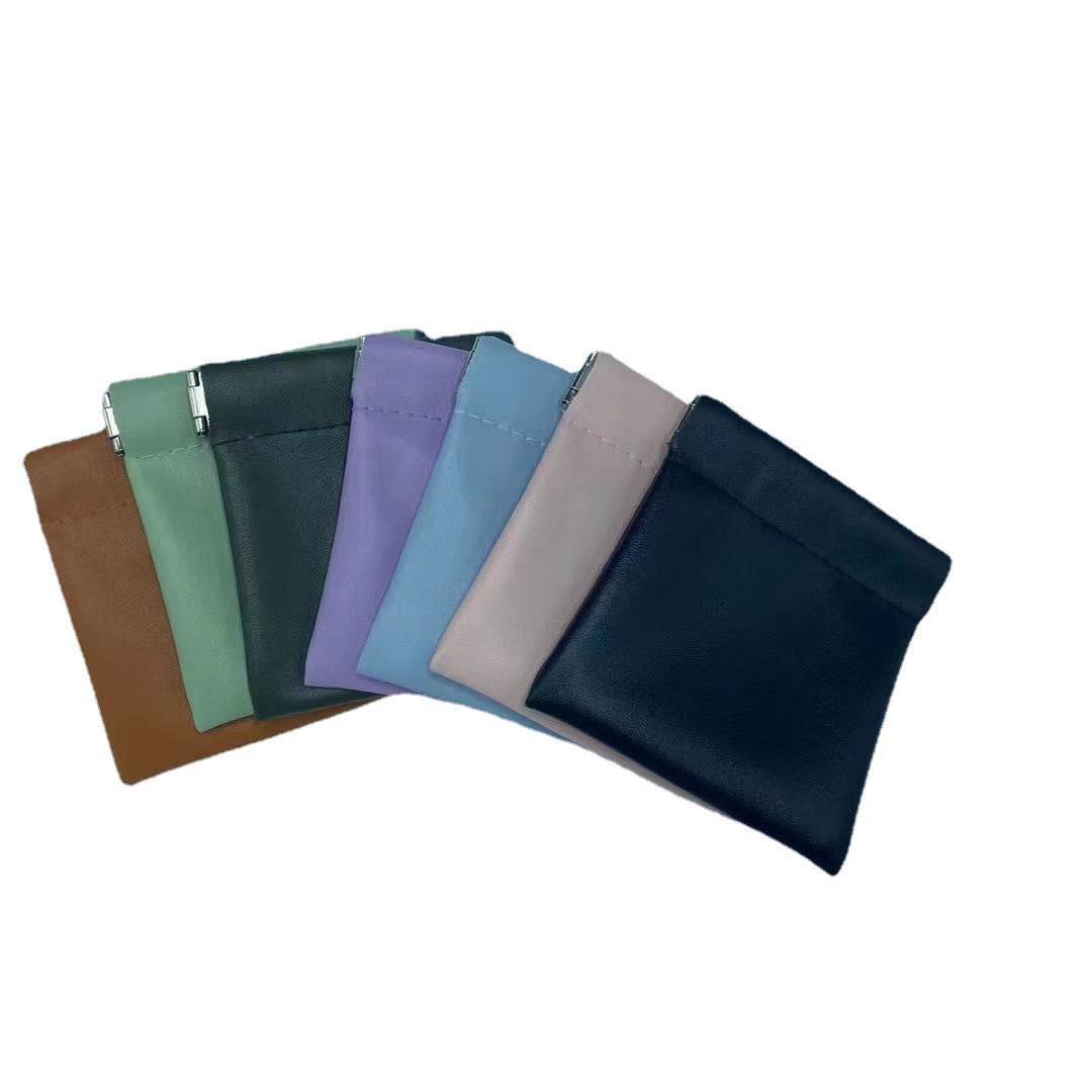 Storage bag spot wholesale PU headset shrapnel storage bag portable automatic closing data cable change storage bag