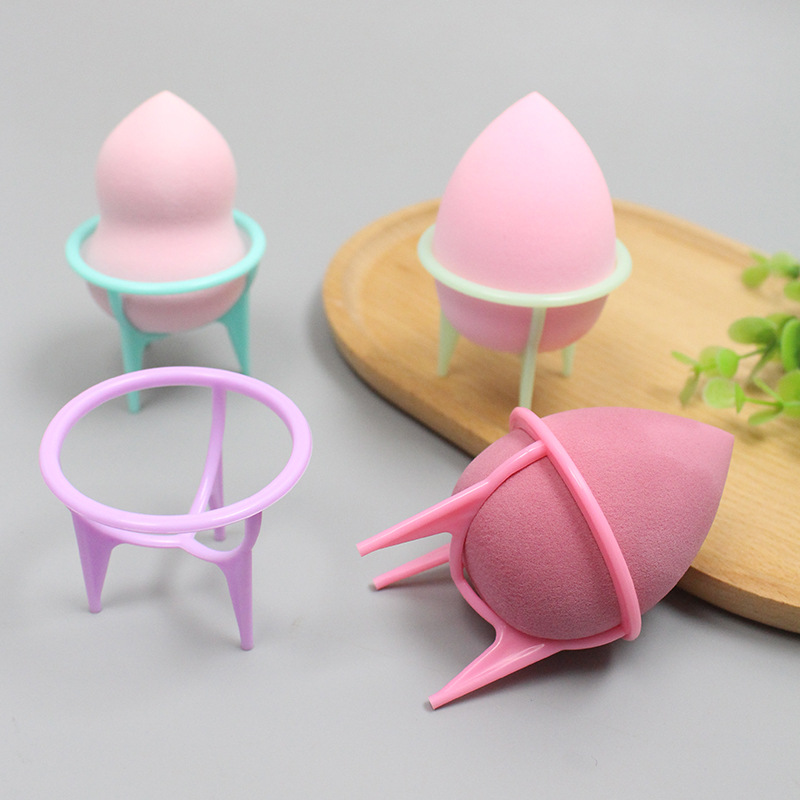 Beauty egg storage bracket tripod plastic shelf makeup sponge egg bracket powder puff face washing puff drying rack wholesale