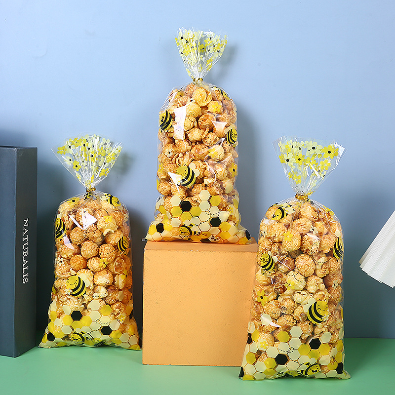 Spot small bee printing bag opp transparent flat bag candy biscuit packaging bag sealing tie silk plastic bag