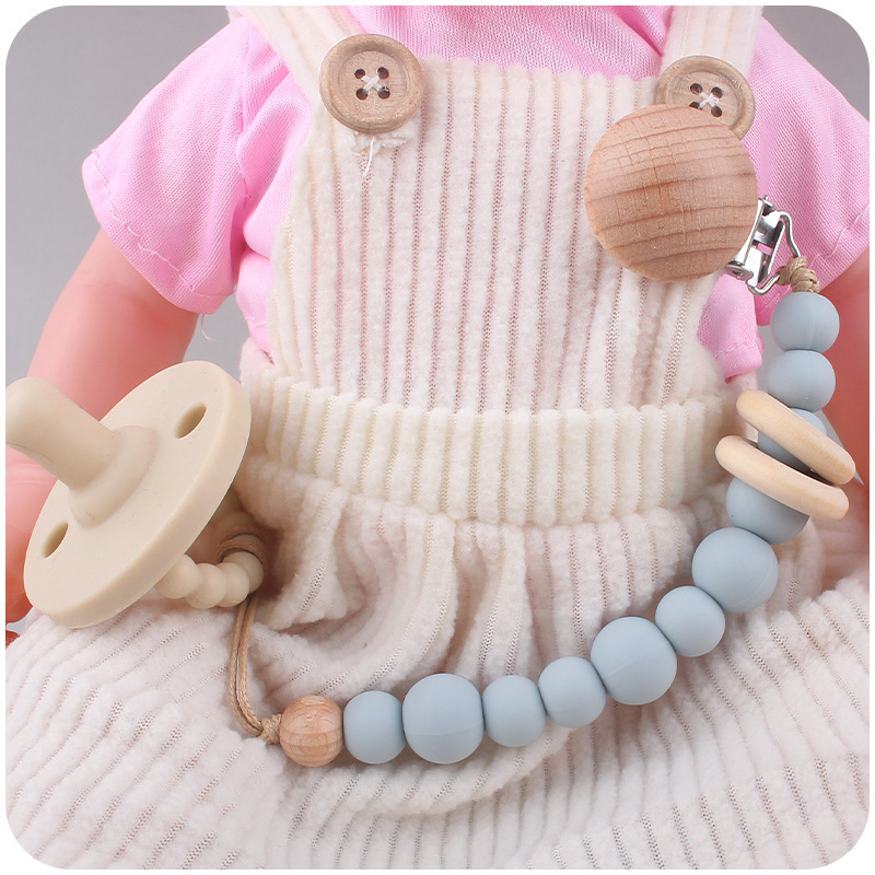 乳幼児用品のイネ科の木の円のアイデアの赤ちゃんのシリコンの玉は歯ぎしりして歯ぎしりして乳の口のチェーンをなだめてチェーンの新型を防ぎます。|undefined