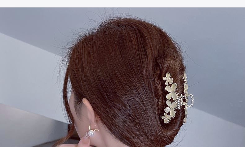 Νέο γυναικείο κλιπ υψηλής αίσθησης 2023 Καλοκαιρινό γατίσιο μάτι πεταλούδα κεφαλιού καρχαρία Κλιπ μαλλιών με κλιπ κεφαλής_voghion.com