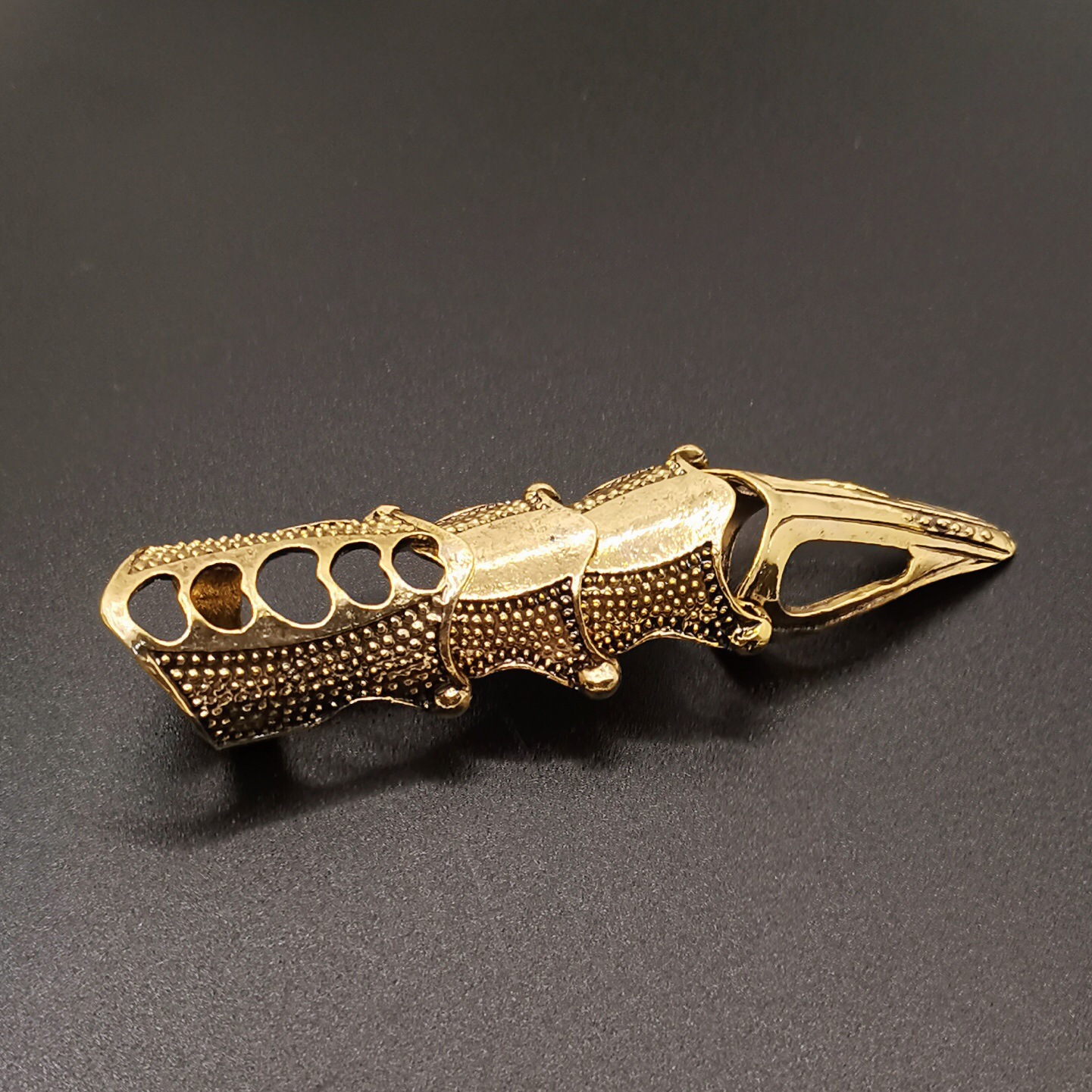 Jewelry manufacturers supply European and American retro punk cool pointed long joint ring four section ring