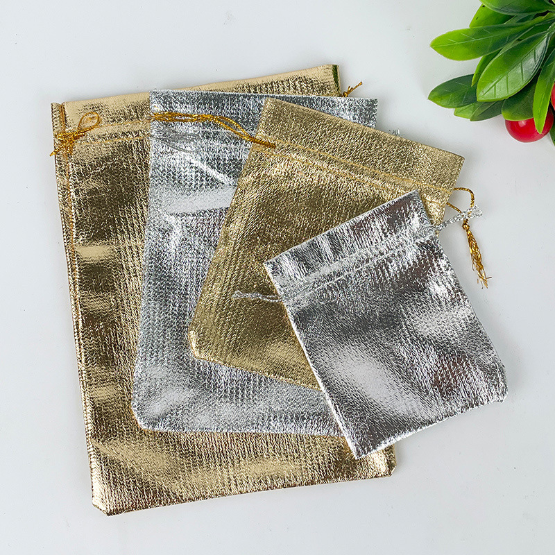 Factory supply cross-border gold and silver cloth bag gold cloth bag jewelry jewelry text play gift storage packaging bag in stock