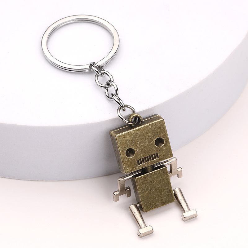 Creative movable robot keychain small box cartoon pendant key ring chain wholesale small gift wholesale
