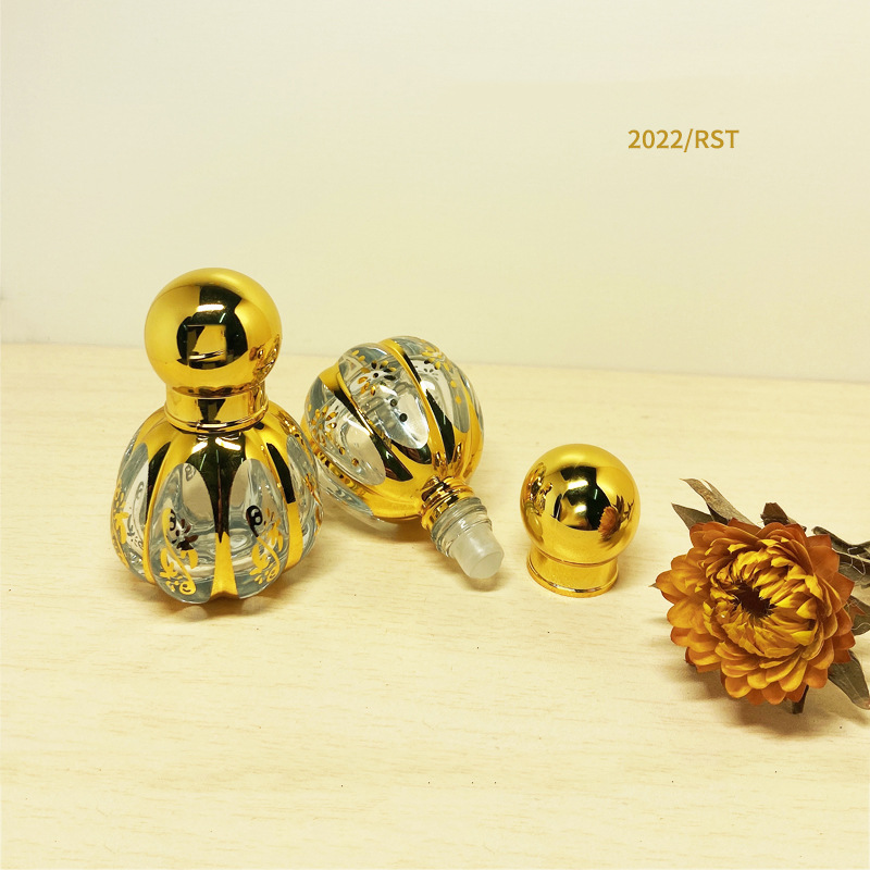 Middle East Glass Essential Oil Bead Bottle Metal Transparent Perfume Bottling Bronzing Plating Process Factory Wholesale